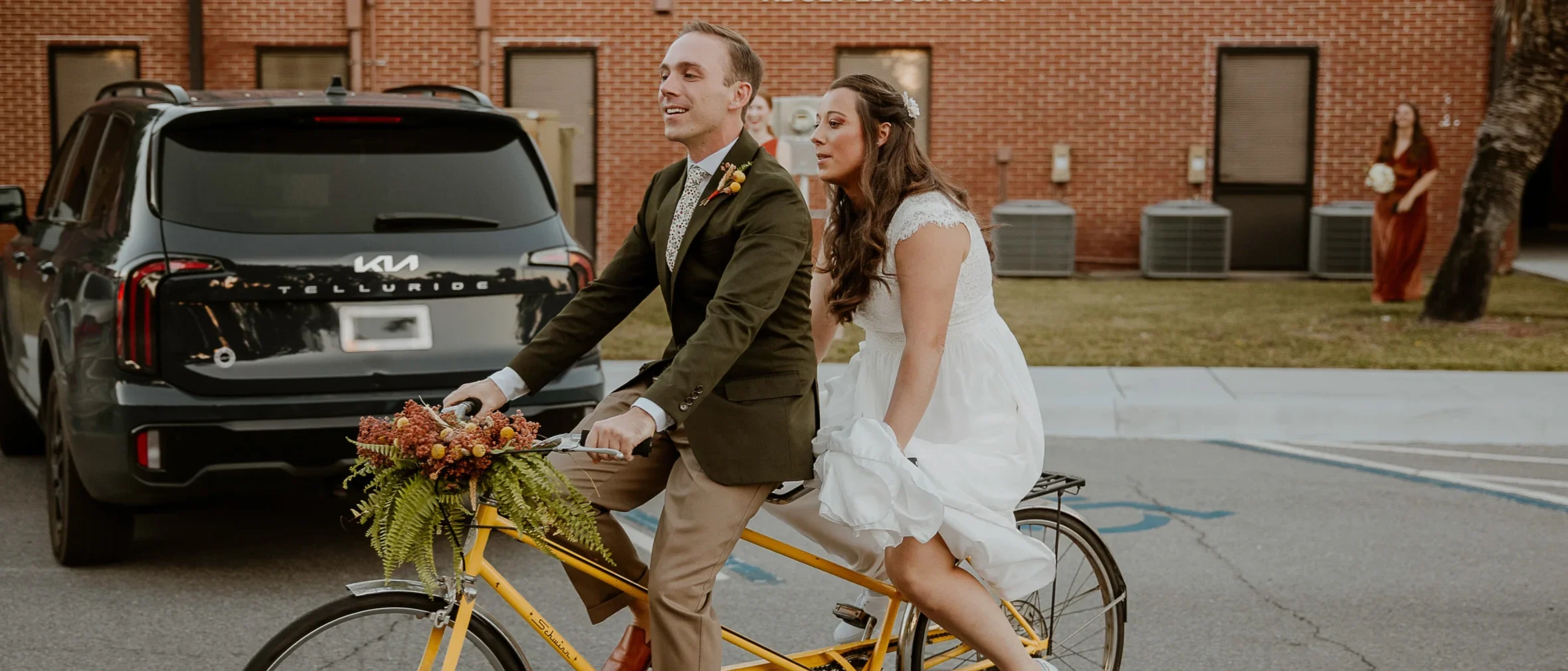 Matt and Mallory Jennings riding to their wedding reception